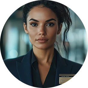 Headshot of a woman with dark hair and a dark blazer